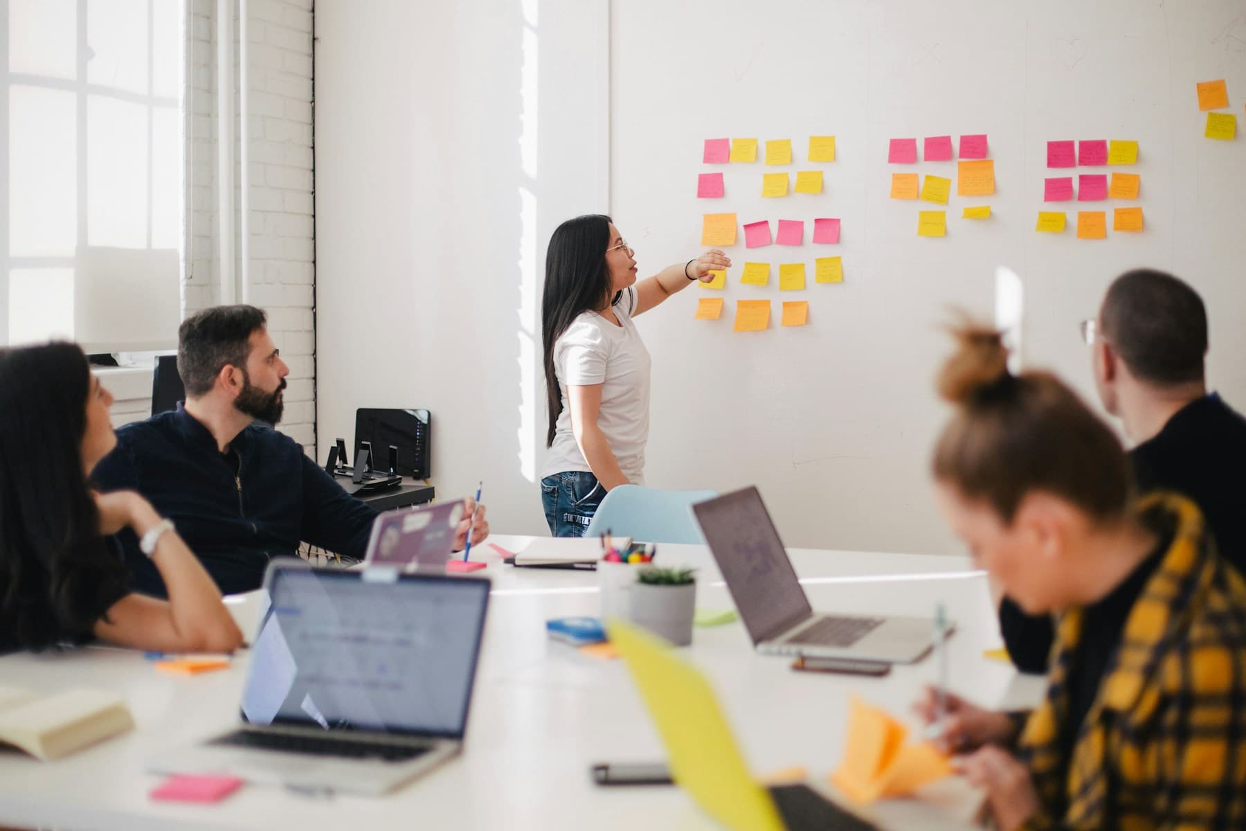 A team discussing ideas in a workshop setting